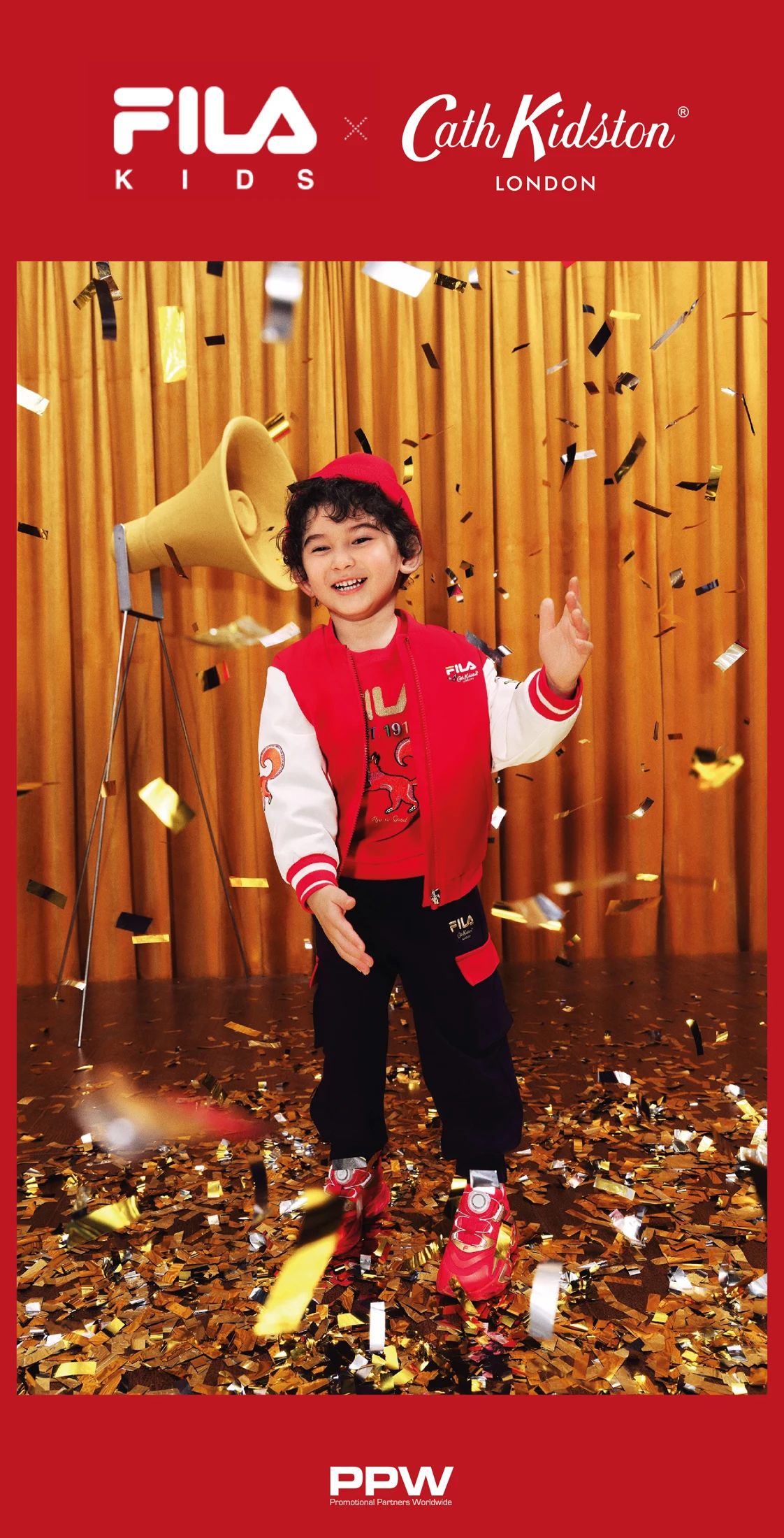 FILA Kids and Cath Kidston campaign showing a child in a red varsity outfit amid confetti