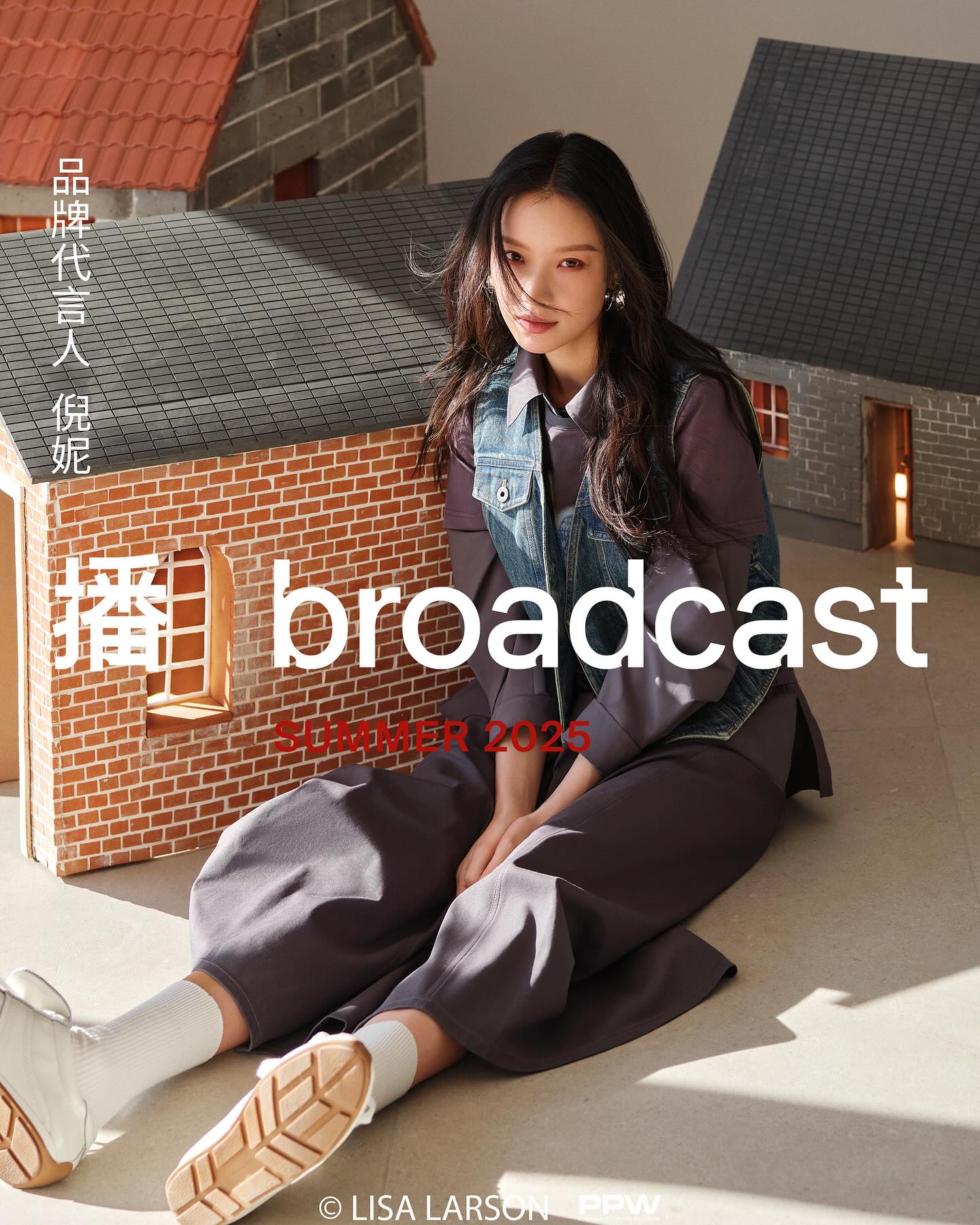 Seated model wearing the Lisa Larson and Broadcast collection